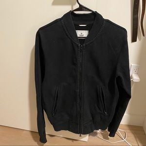 Small black reigning champ bomber